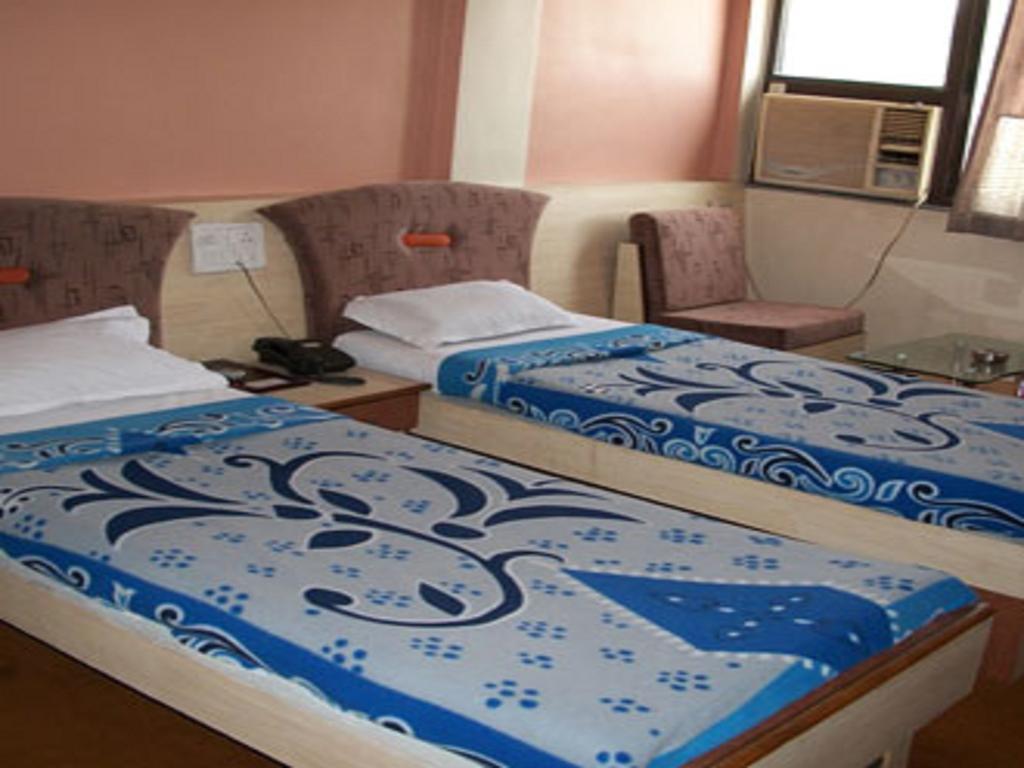 Hotel Tourist International Пуна Экстерьер фото